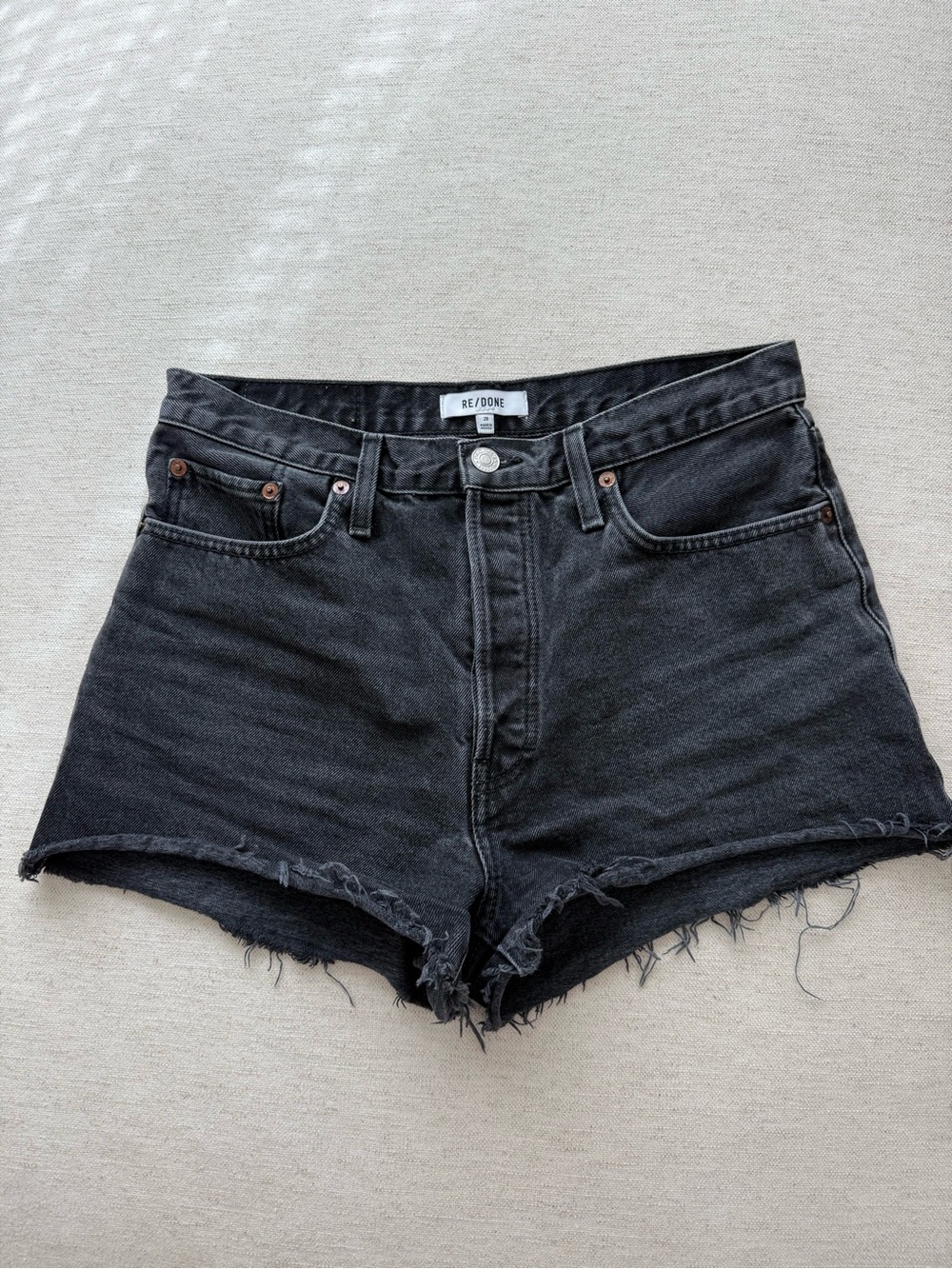 Re/Done Black High-Rise Frayed Denim Shorts